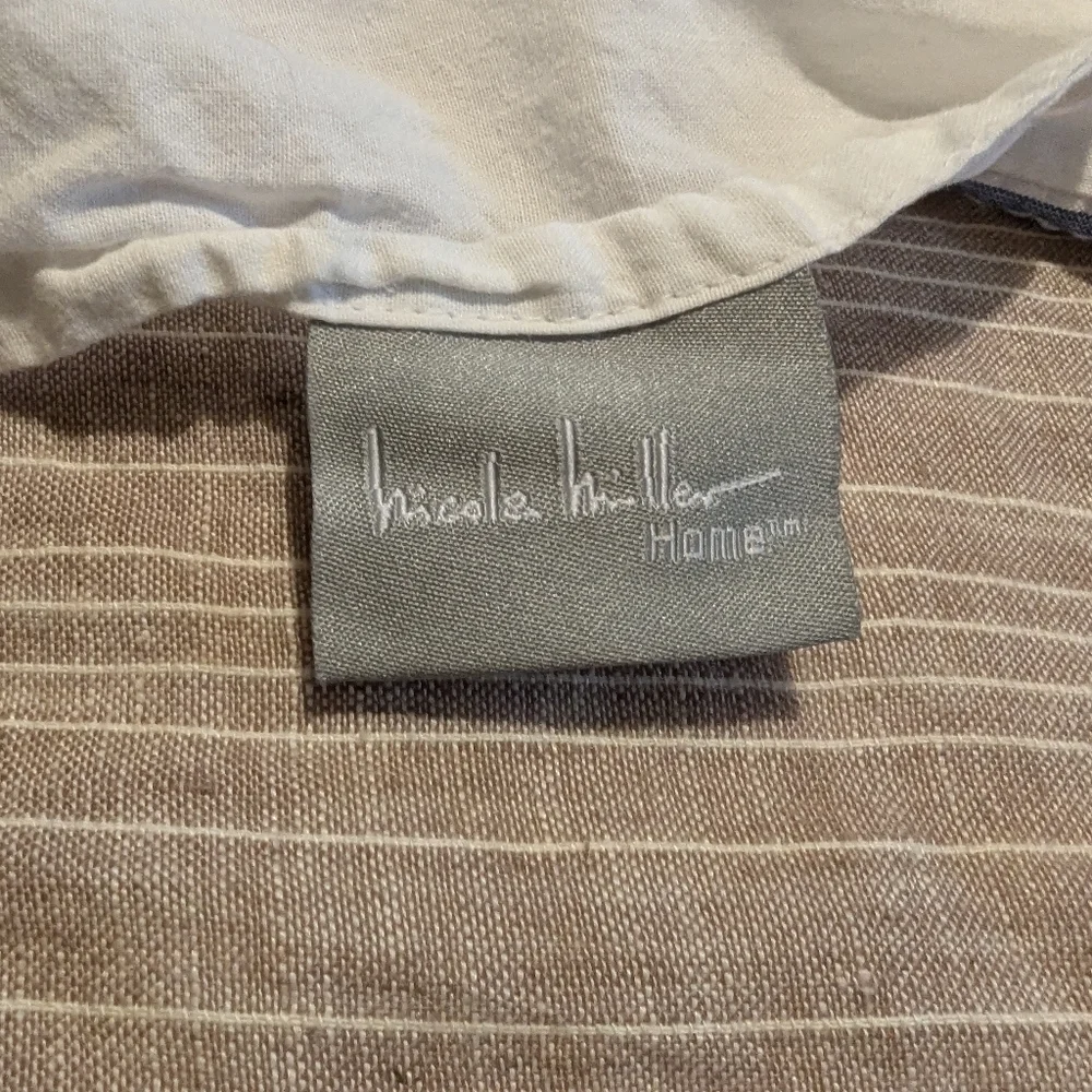 Pair of Nicole Miller embroidered seersucker cotton stripe shams